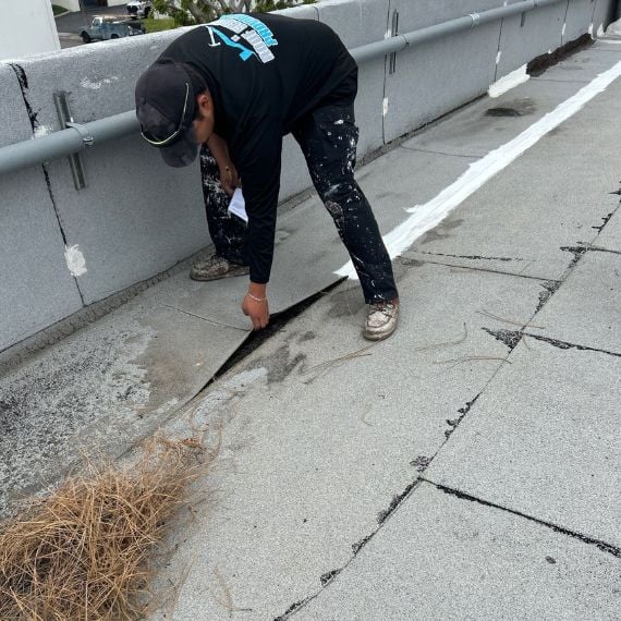 a Roof Service Providers roofer performing a roof inspection