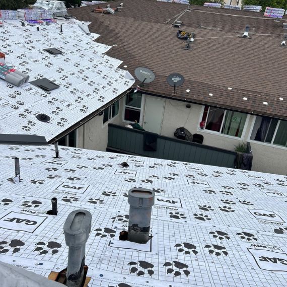 A roof being replaced on townhomes in Orange County CA