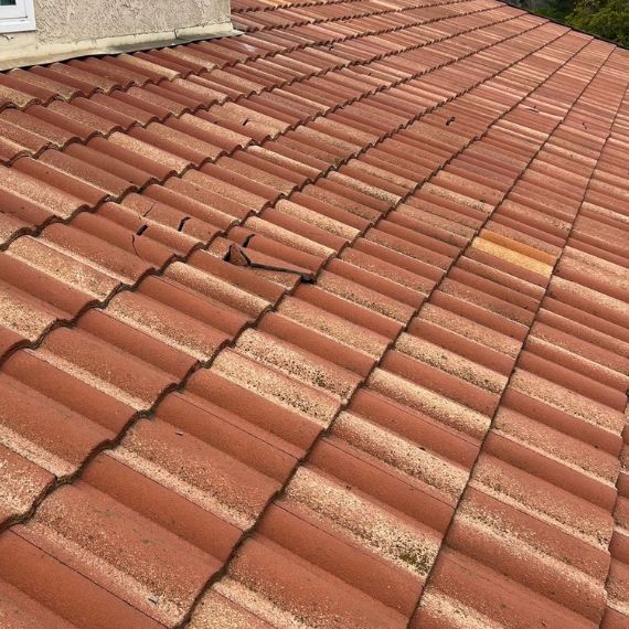Cracked tiles on a the roof of a home in Orange County, CA